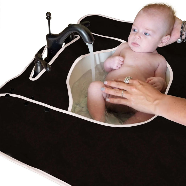 Baby Sink Bath with a Black Splashpad Bathroom Mat